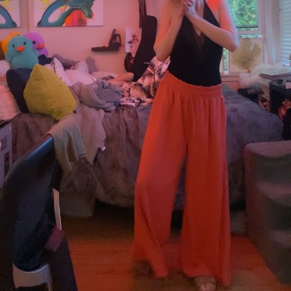 Elegant Black Top with Flowing Coral Pants - Picture 7 of 17